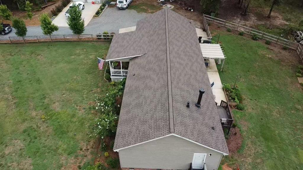 Ariel photo of home with new HDZ Barkwood roofing Shingles