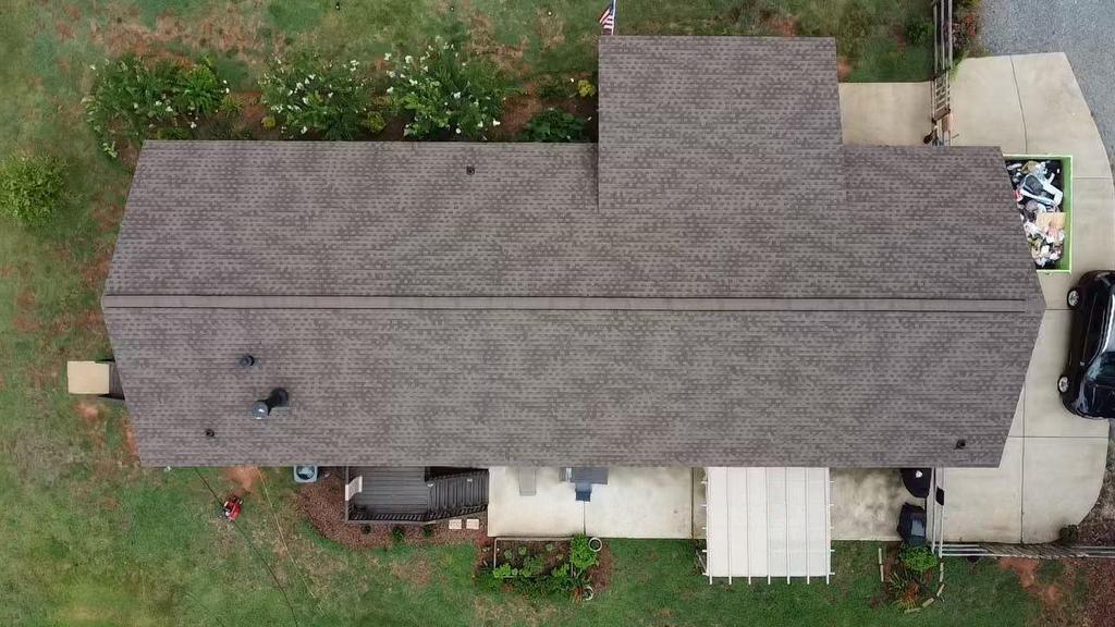 Ariel photo of home with new HDZ Barkwood roofing Shingles
